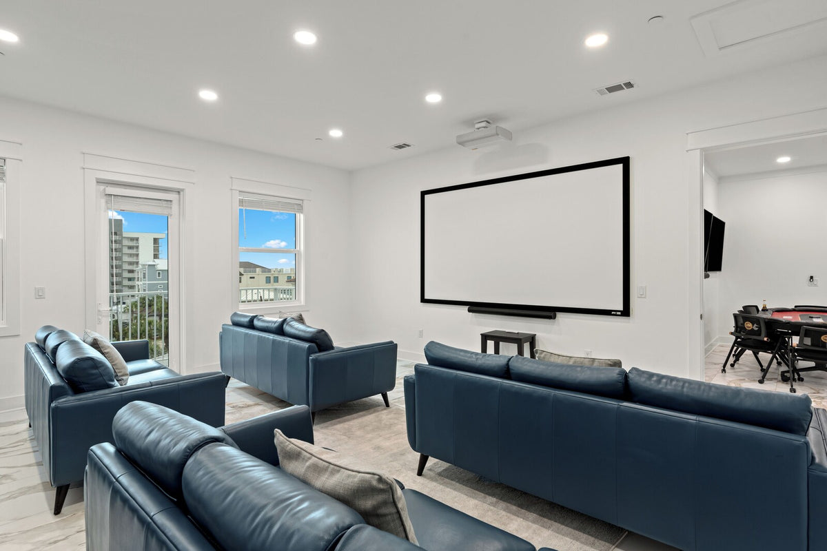 Home theater room with premium seating